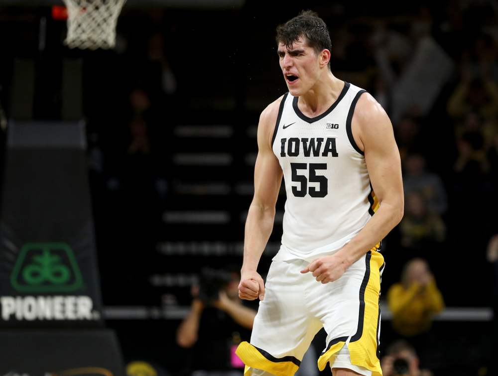 Iowa Hawkeyes forward Luka Garza (55) celebrates a three point basket against the Maryland Terrapins Friday, January 10, 2020 at Carver-Hawkeye Arena. (Brian Ray/hawkeyesports.com)