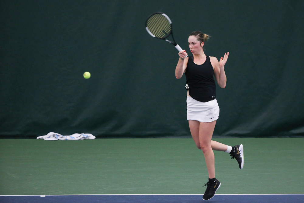 Iowa’s Samantha Mannix returns a hit during the Iowa women’s tennis meet vs DePaul on Friday, February 21, 2020 at the Hawkeye Tennis and Recreation Complex. (Lily Smith/hawkeyesports.com)