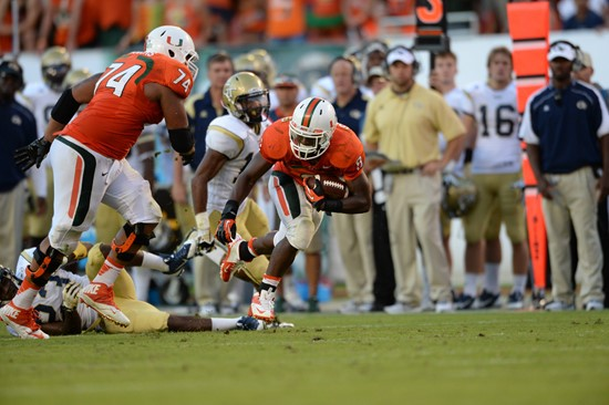 University of Miami Hurricanes running back Duke Johnson #8 plays in a game against the Georgia Tech Yellow Jackets at Sun Life Stadium on October 5,...