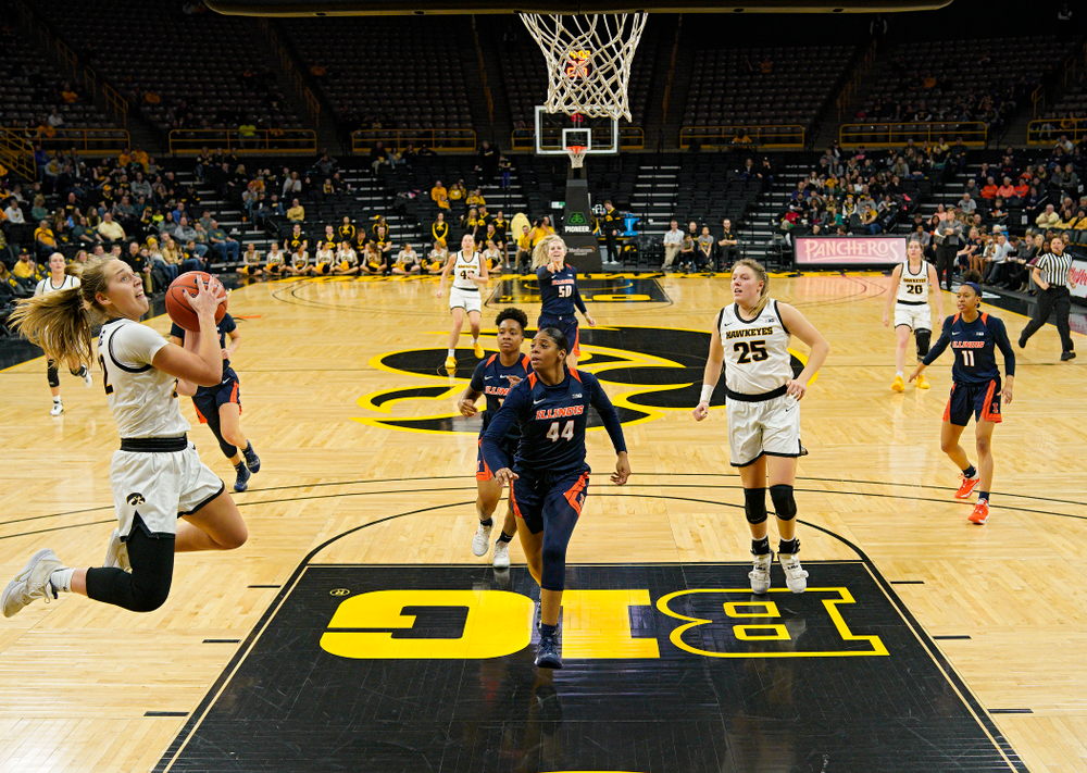 Iowa Hawkeyes guard Kathleen Doyle (22) takes a pass and scores during the fourth quarter of their game at Carver-Hawkeye Arena in Iowa City on Tuesday, December 31, 2019. (Stephen Mally/hawkeyesports.com)