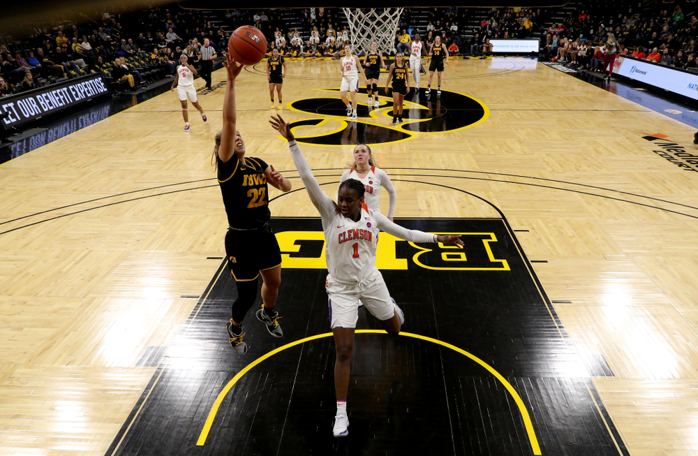 Iowa Hawkeyes guard Kathleen Doyle (22) goes to the hoop against Clemson Wednesday, December 4, 2019 at Carver-Hawkeye Arena. (Brian Ray/hawkeyesports.com)
