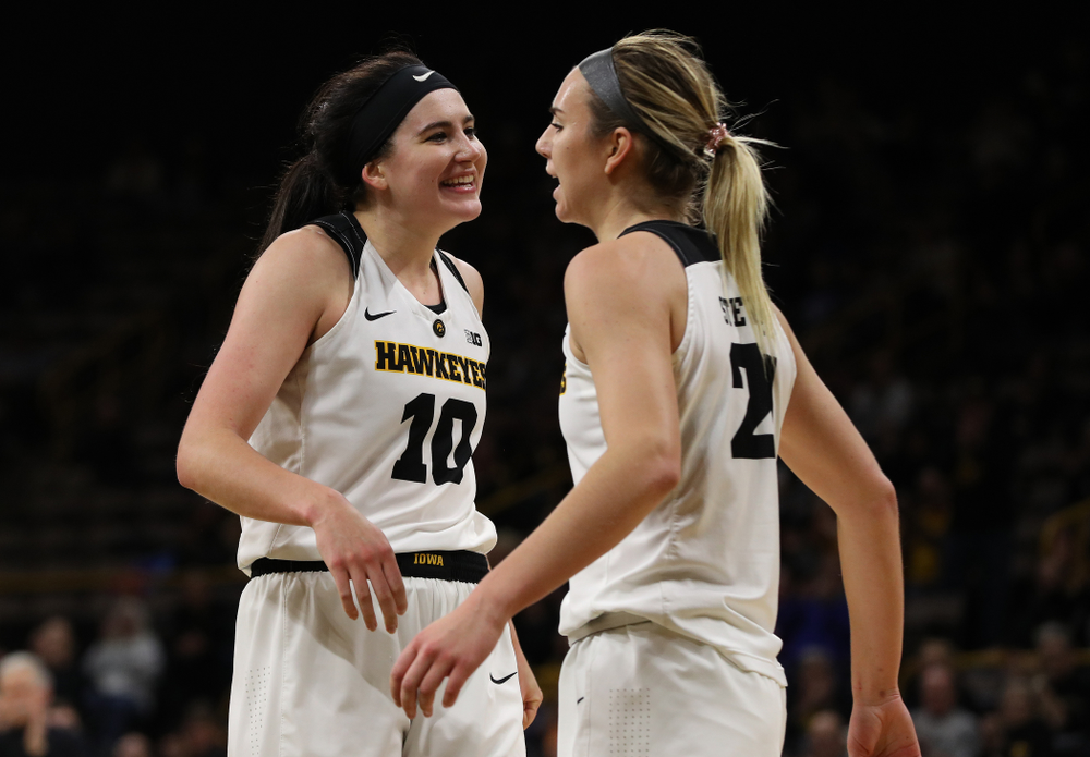 Iowa Hawkeyes forward Megan Gustafson (10) and forward Hannah Stewart (21) against the Michigan Wolverines Thursday, January 17, 2019 at Carver-Hawkeye Arena. (Brian Ray/hawkeyesports.com)