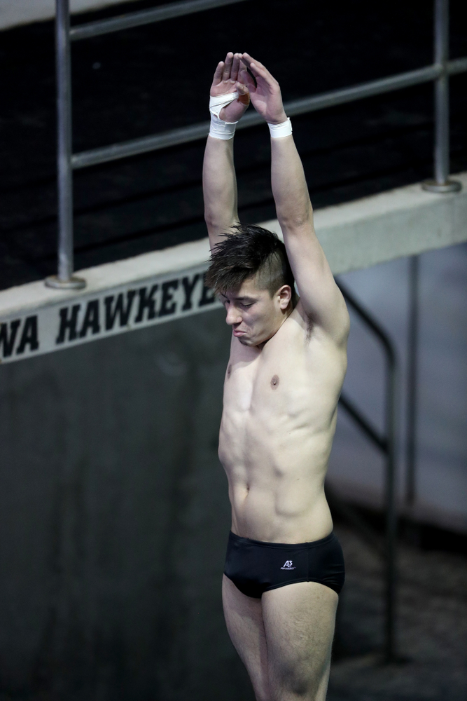 IowaÕs Jonatan Posligua competes on the 1 meter springboard against Notre Dame and Illinois Saturday, January 11, 2020 at the Campus Recreation and Wellness Center. (Brian Ray/hawkeyesports.com)