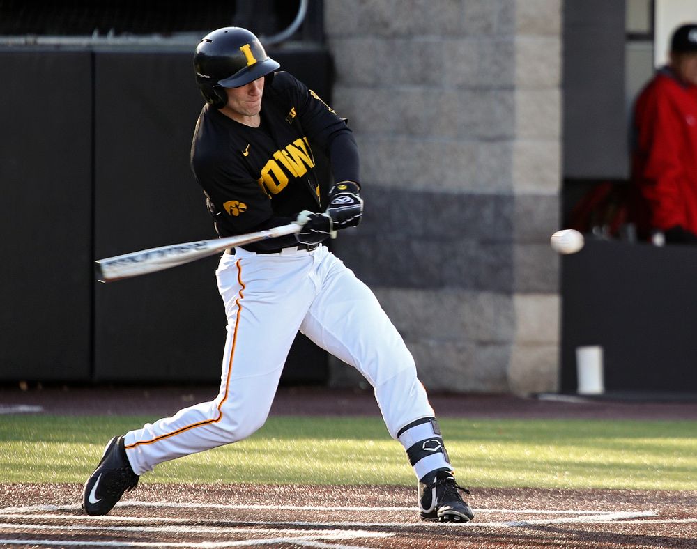 Iowa left fielder Austin Martin (34) gets a hit during the first inning of their game at Duane Banks Field in Iowa City on Tuesday, March 3, 2020. (Stephen Mally/hawkeyesports.com)