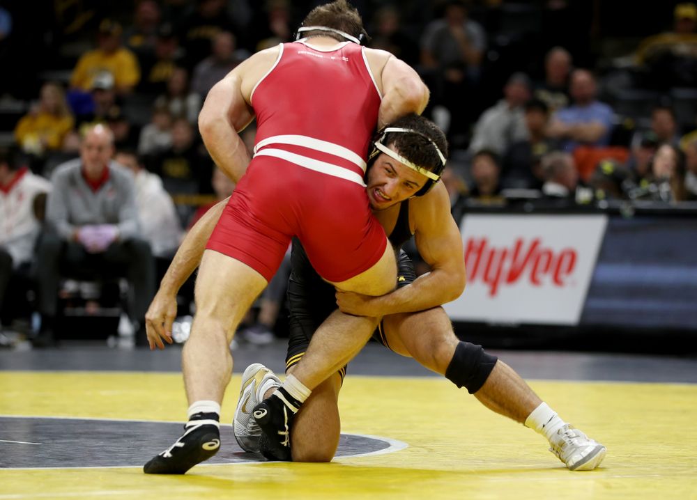 IowaÕs Michael Kemerer wrestles WisconsinÕs Jared Krattinger at 174 pounds Sunday, December 1, 2019 at Carver-Hawkeye Arena. Kemerer won the match with a fall. (Brian Ray/hawkeyesports.com)