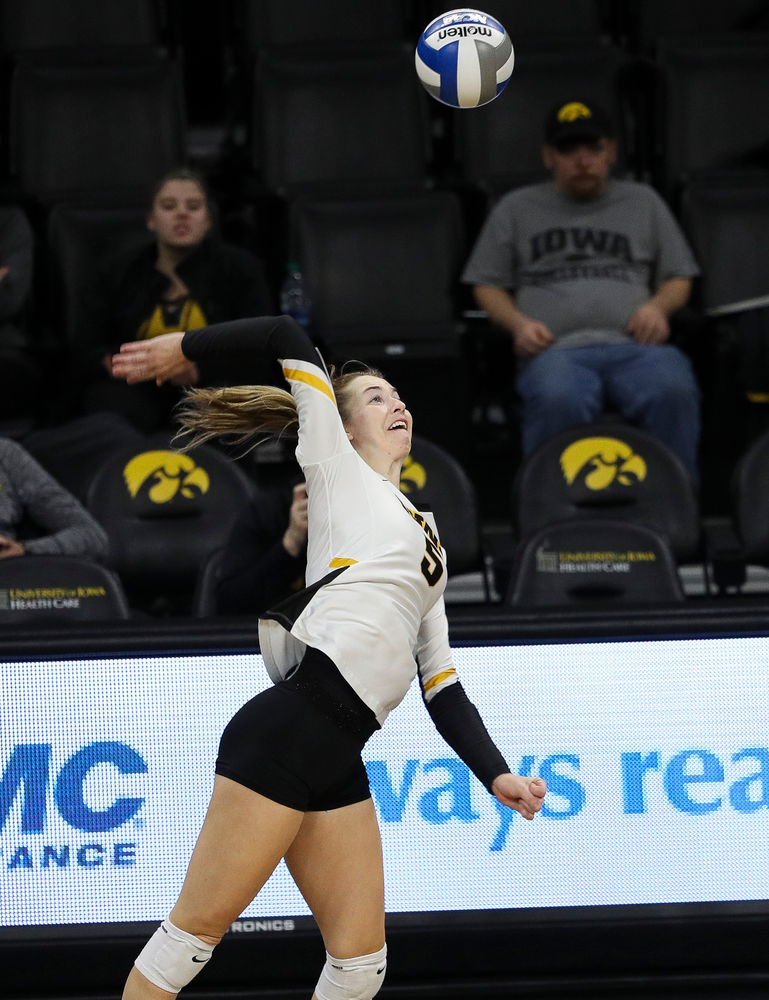 Iowa Hawkeyes outside hitter Meghan Buzzerio (5) spikes the ball during a match against Maryland at Carver-Hawkeye Arena on November 23, 2018. (Tork Mason/hawkeyesports.com)