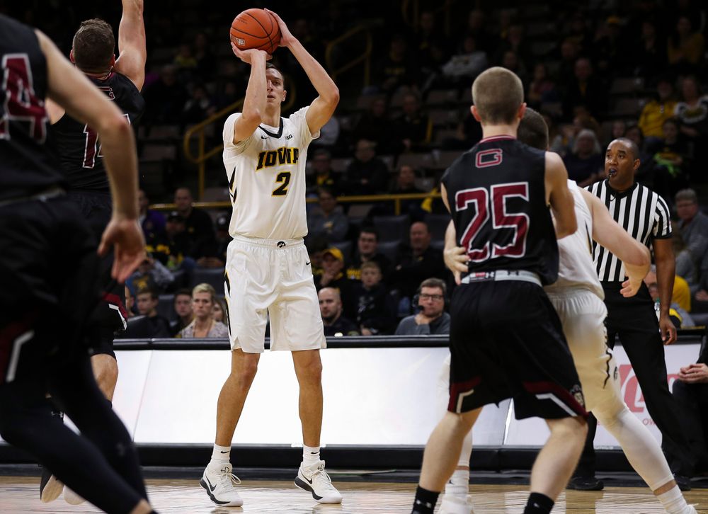 Iowa Hawkeyes forward Jack Nunge (2) puts up a 3-pointer during a game against Guilford College at Carver-Hawkeye Arena on November 4, 2018. (Tork Mason/hawkeyesports.com)