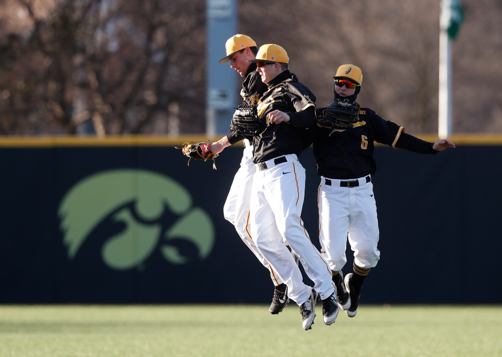 Iowa Hawkeyes outfielder Ben Norman (9), outfielder Robert Neustrom (44), and outfielder Justin Jenkins (6) against Grand View Wednesday, April 4, 2018 at Duane Banks Field. (Brian Ray/hawkeyesports.com)
