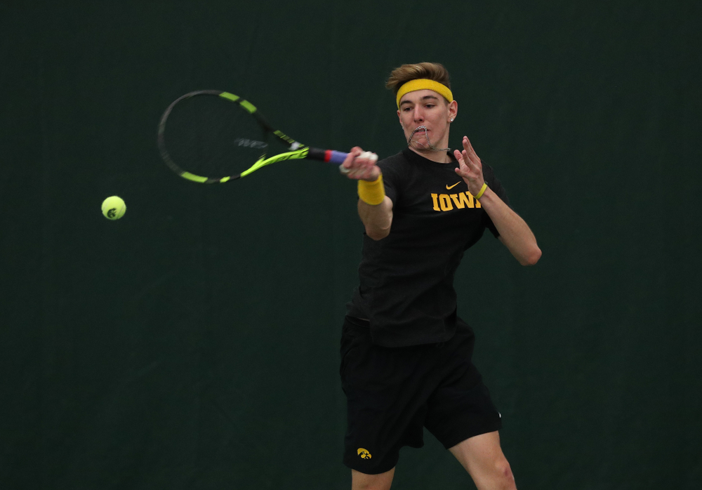 Iowa's Nikita Snezhko against UMKC Friday, February 15, 2019 at the Hawkeye Tennis and Recreation Complex. (Brian Ray/hawkeyesports.com)