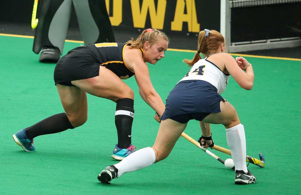 Iowa Hawkeyes midfielder Katie Birch (11) defends during a game against Michigan at Grant Field on October 5, 2018. (Tork Mason/hawkeyesports.com)