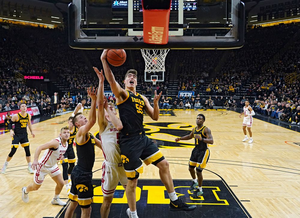 Iowa Hawkeyes center Luka Garza (55) pulls in a rebound during the second half of their game at Carver-Hawkeye Arena in Iowa City on Monday, January 27, 2020. (Stephen Mally/hawkeyesports.com)