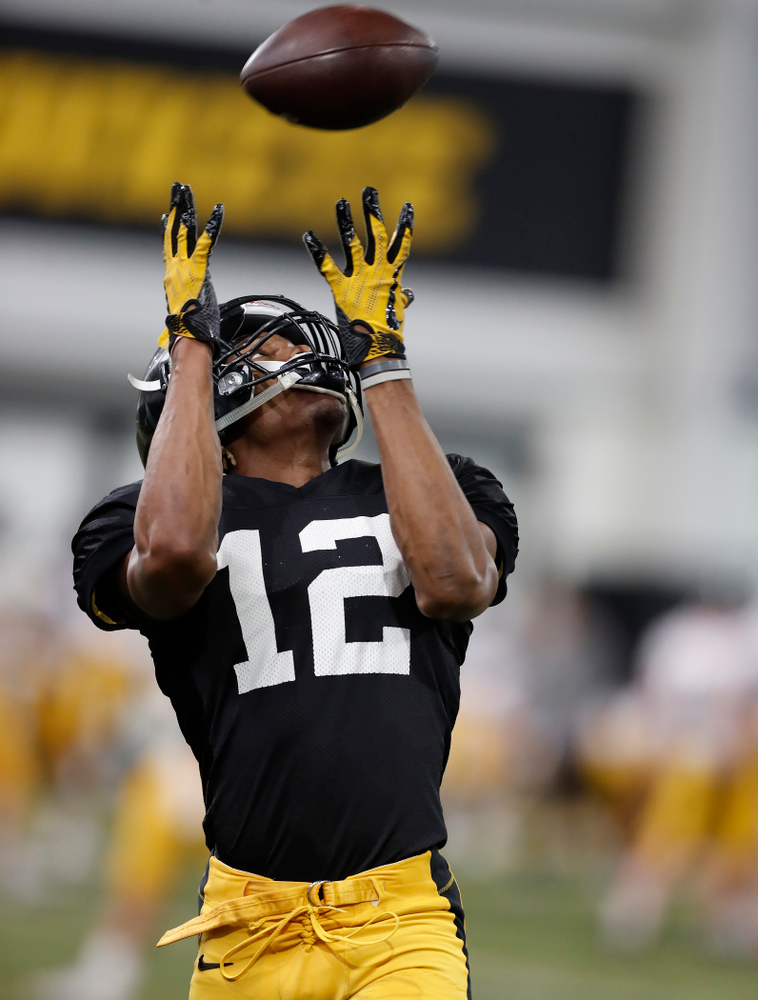 Iowa Hawkeyes wide receiver Brandon Smith (12) during spring practice Wednesday, March 28, 2018 at the Hansen Football Performance Center. (Brian Ray/hawkeyesports.com)