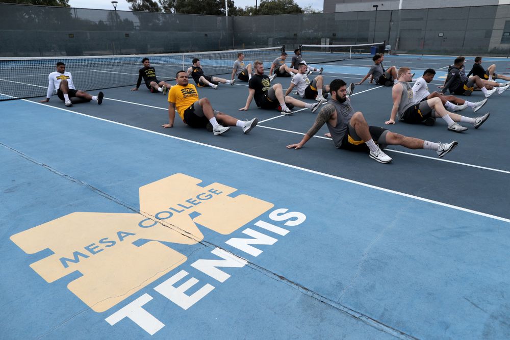 The Iowa Hawkeyes warm up for a lift before practice Sunday, December 22, 2019 at Mesa College in San Diego. (Brian Ray/hawkeyesports.com)