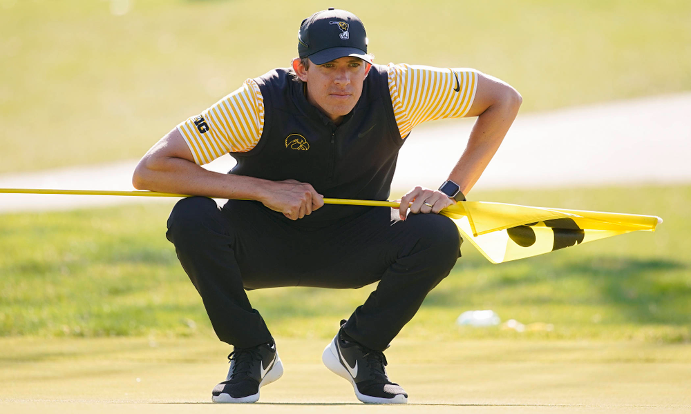 Iowa assistant coach Charlie Hoyle reads the green during the third round of the Hawkeye Invitational at Finkbine Golf Course in Iowa City on Sunday, Apr. 21, 2019. (Stephen Mally/hawkeyesports.com)
