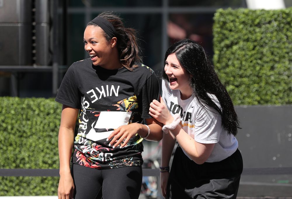 Iowa Hawkeyes forward Megan Gustafson (10) and UCONNÕs Napheesa Collier during a Special Olympics event Friday, April 12, 2019 as part of the ESPN College Basketball Awards in the XBOX Plaza at LA Live. (Brian Ray/hawkeyesports.com)