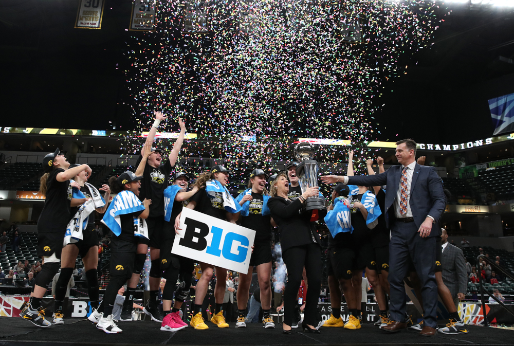 The Iowa Hawkeyes celebrate their victory overthe Maryland Terrapins in the Big Ten Championship Game Sunday, March 10, 2019 at Bankers Life Fieldhouse in Indianapolis, Ind. (Brian Ray/hawkeyesports.com)