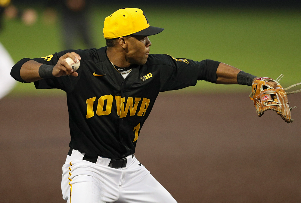 Iowa Hawkeyes third baseman Lorenzo Elion (1) throws to first for an out after fielding a ground ball during the sixth inning of their game against Western Illinois at Duane Banks Field in Iowa City on Wednesday, May. 1, 2019. (Stephen Mally/hawkeyesports.com)