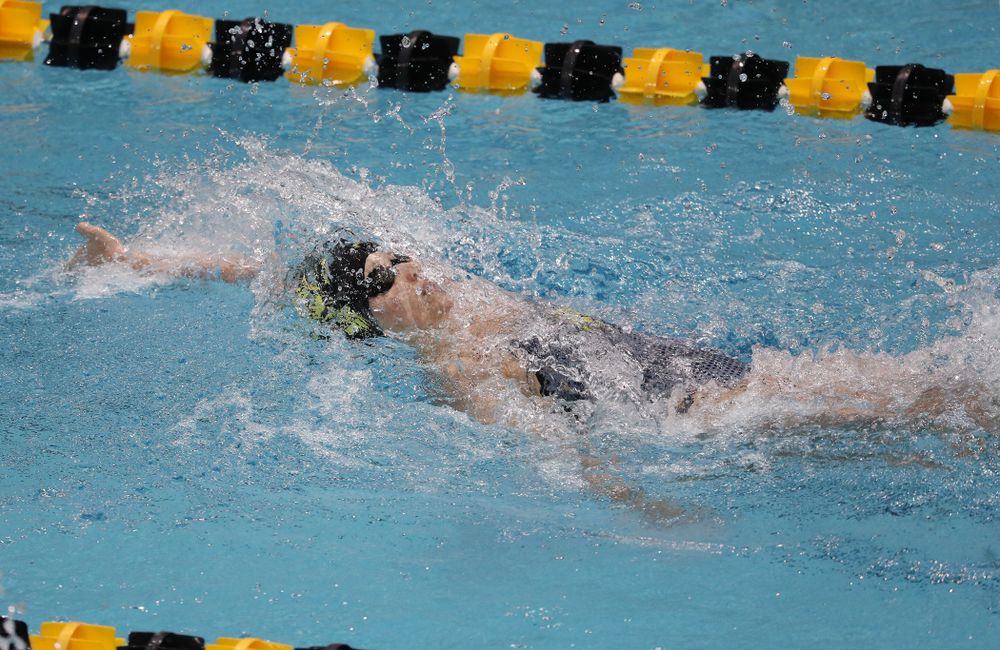 IowaÕs Julia Koluch competes in the 100 yard backstroke against Notre Dame and Illinois Saturday, January 11, 2020 at the Campus Recreation and Wellness Center. (Brian Ray/hawkeyesports.com)