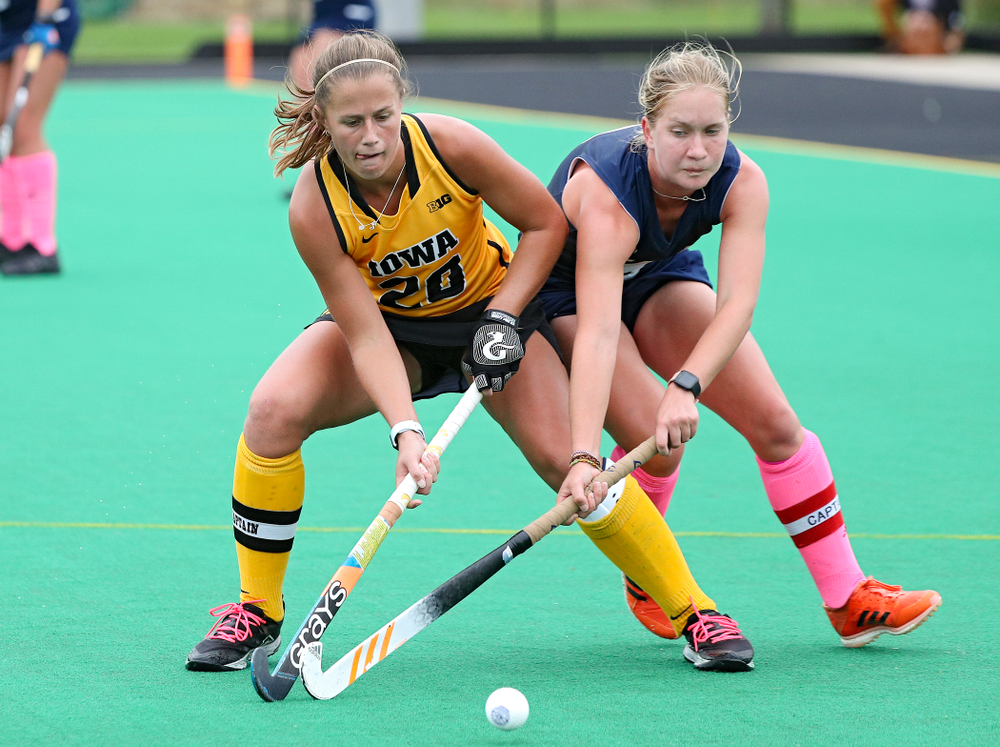 Iowa’s Sophie Sunderland (20) battles for position on the ball during the fourth quarter of their game against UC Davis at Grant Field in Iowa City on Sunday, Oct 6, 2019. (Stephen Mally/hawkeyesports.com)