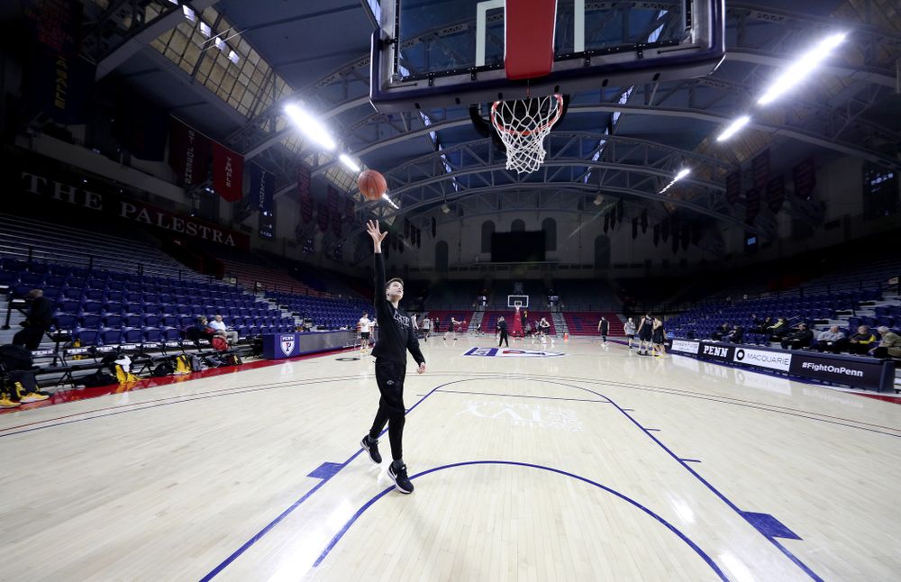 Jack McCaffery shoots baskets before practice at the Palestra Friday, January 3, 2020 in Philadelphia. (Brian Ray/hawkeyesports.com)