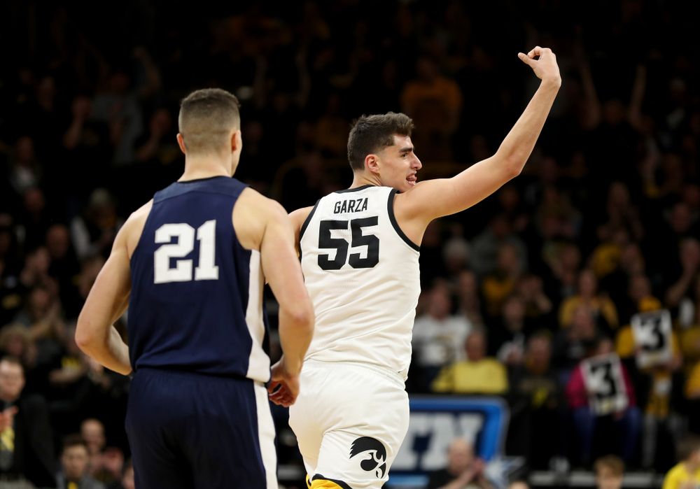 Iowa Hawkeyes forward Luka Garza (55) celebrates a three point basket against Penn State Saturday, February 29, 2020 at Carver-Hawkeye Arena. (Brian Ray/hawkeyesports.com)