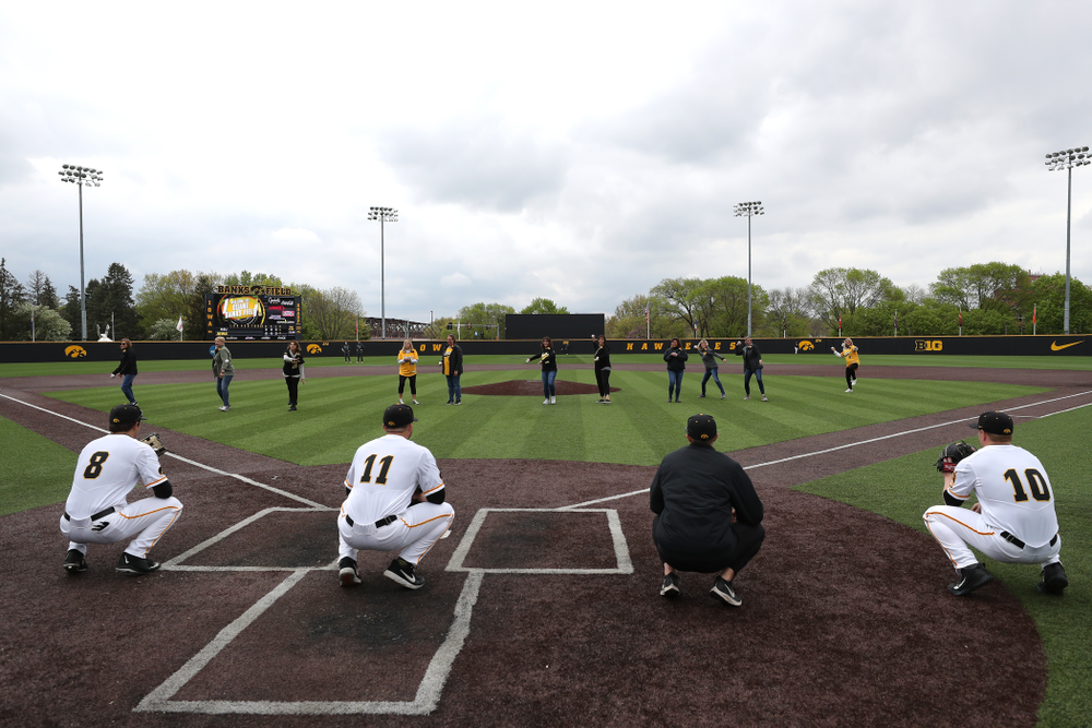 The senior moms throw out a first pitch before their game against Michigan State Sunday, May 12, 2019 at Duane Banks Field. (Brian Ray/hawkeyesports.com)