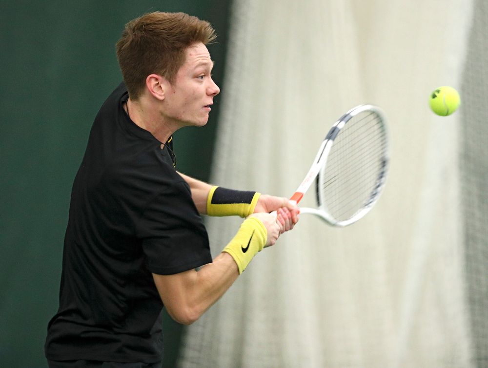 Iowa’s Jason Kerst returns a shot during their match at the Hawkeye Tennis and Recreation Complex in Iowa City on Thursday, January 16, 2020. (Stephen Mally/hawkeyesports.com)