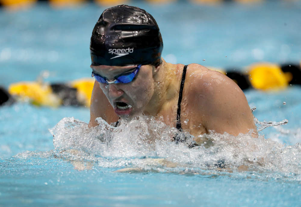 IowaÕs Sage Ohlensehlen competes in the 100 yard breaststroke against Notre Dame and Illinois Saturday, January 11, 2020 at the Campus Recreation and Wellness Center. (Brian Ray/hawkeyesports.com)