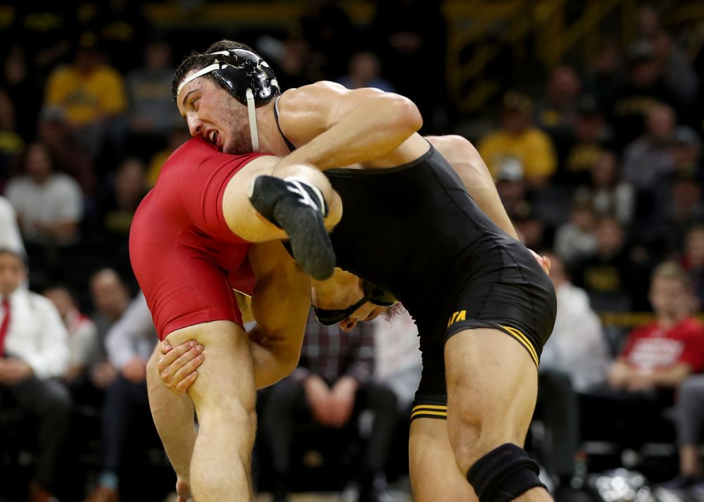 IowaÕs Michael Kemerer wrestles WisconsinÕs Jared Krattinger at 174 pounds Sunday, December 1, 2019 at Carver-Hawkeye Arena. Kemerer won the match with a fall. (Brian Ray/hawkeyesports.com)