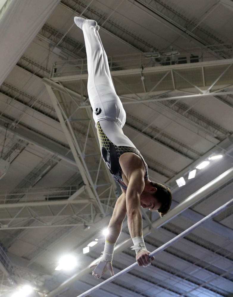 Iowa’s Alex Walther competes on the high bar against UIC and Minnesota Saturday, February 1, 2020 at Carver-Hawkeye Arena. (Brian Ray/hawkeyesports.com)