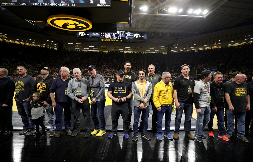 Legendary former head coach Dan Gable shakes hands with Iowa Wrestling alumni during the Iowa Hawkeyes dual against Oklahoma State Sunday, February 23, 2020 at Carver-Hawkeye Arena. (Brian Ray/hawkeyesports.com)