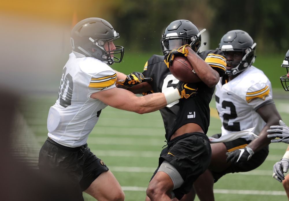 Iowa Hawkeyes defensive back Jake Gervase (30) and wide receiver Ihmir Smith-Marsette (6) during the third practice of fall camp Sunday, August 5, 2018 at the Kenyon Football Practice Facility. (Brian Ray/hawkeyesports.com)