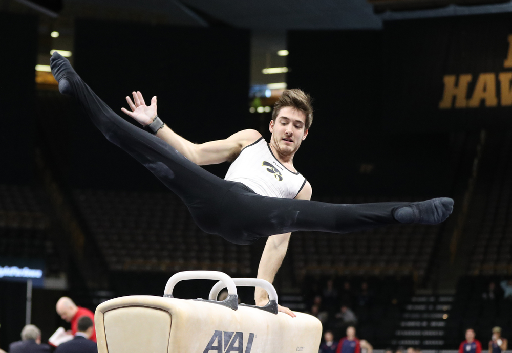 Iowa's Kevin Johnson competes on the pommel horse against UIC and Minnesota Saturday, February 2, 2019 at Carver-Hawkeye Arena. (Brian Ray/hawkeyesports.com)