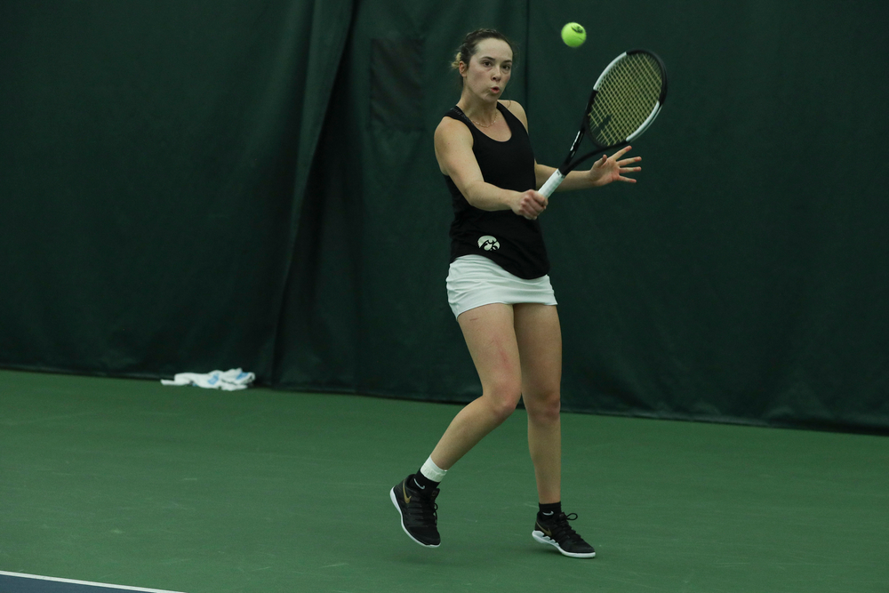 Iowa’s Samantha Mannix returns a hit during the Iowa women’s tennis meet vs DePaul on Friday, February 21, 2020 at the Hawkeye Tennis and Recreation Complex. (Lily Smith/hawkeyesports.com)