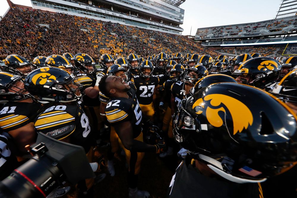 Iowa Hawkeyes linebacker Amani Jones (52) pumps up his teammates before their game against the Wisconsin Badgers Saturday, September 22, 2018 at Kinnick Stadium. (Brian Ray/hawkeyesports.com)