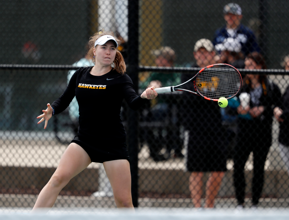Elise Van Heuvelen and Anastasia Reimchen play a doubles match against the Wisconsin Badgers Sunday, April 22, 2018 at the Hawkeye Tennis and Recreation Center. (Brian Ray/hawkeyesports.com)
