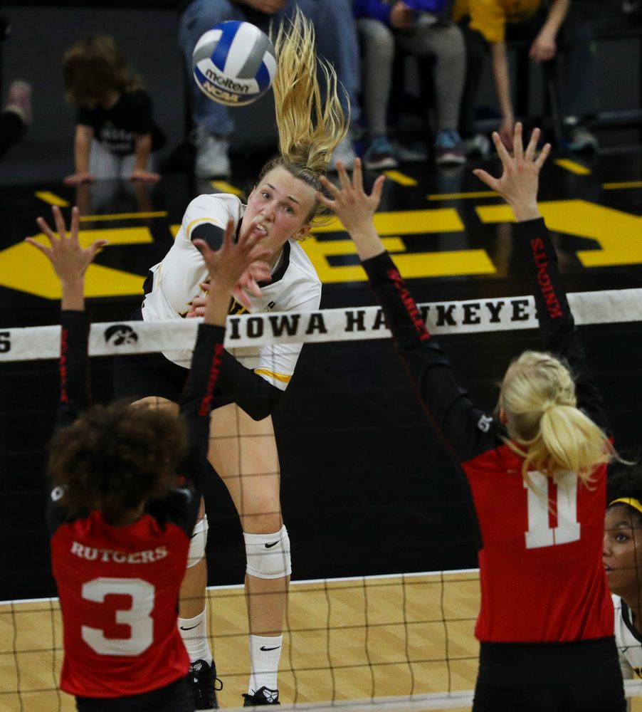 Iowa Hawkeyes outside hitter Cali Hoye (14) spikes the ball during a match against Rutgers at Carver-Hawkeye Arena on November 2, 2018. (Tork Mason/hawkeyesports.com)