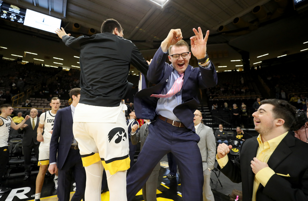 Iowa Hawkeyes forward Ryan Kriener (15) and manager Lucas Pauley against North Florida Thursday, November 21, 2019 at Carver-Hawkeye Arena. (Brian Ray/hawkeyesports.com)
