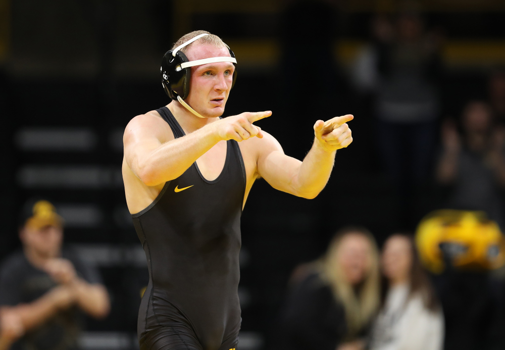 Iowa's Kaleb Young wrestles Purdue's Griffin Parriott at 157 pounds Saturday, November 24, 2018 at Carver-Hawkeye Arena. (Brian Ray/hawkeyesports.com)