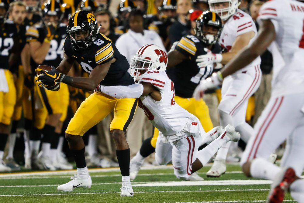Iowa Hawkeyes wide receiver Ihmir Smith-Marsette (6) runs the ball during a game against Wisconsin at Kinnick Stadium on September 22, 2018. (Tork Mason/hawkeyesports.com)
