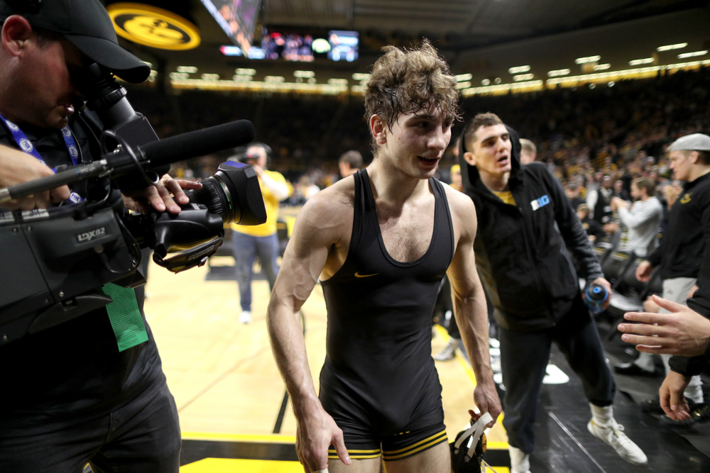IowaÕs Austin DeSanto wrestles WisconsinÕs Seth Gross at 133 pounds Sunday, December 1, 2019 at Carver-Hawkeye Arena. DeSanto won the match 6-2. (Brian Ray/hawkeyesports.com)