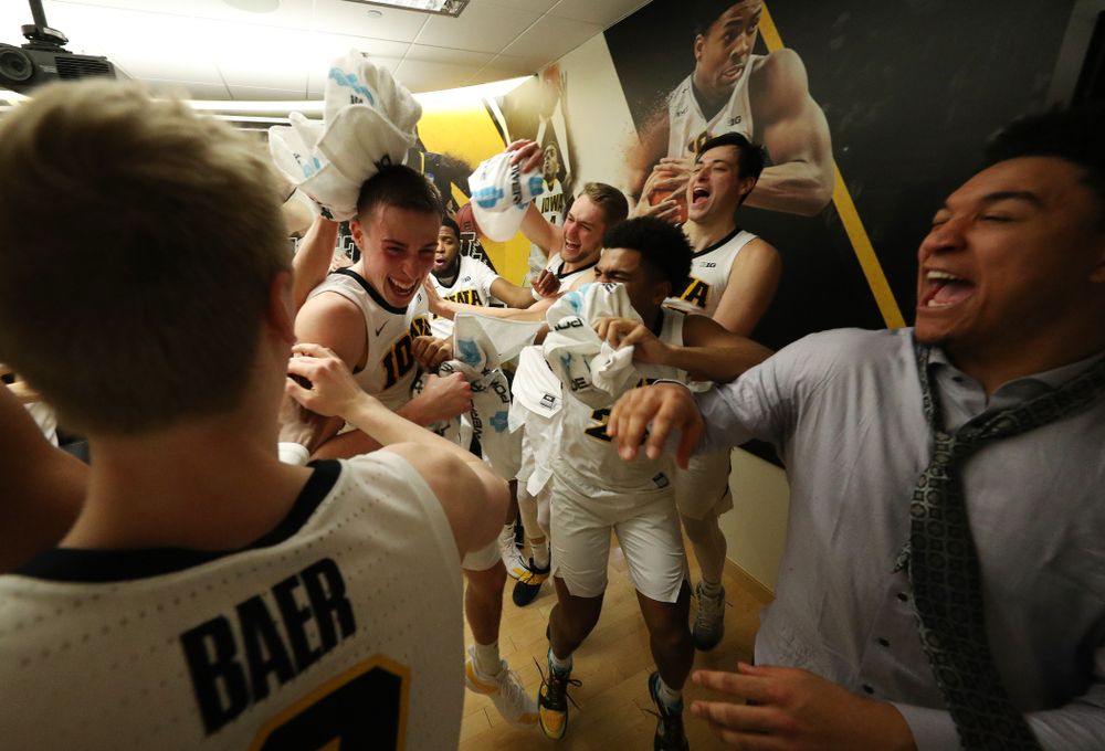 Iowa Hawkeyes guard Joe Wieskamp (10) dances with his teammates following their win against the Michigan Wolverines Friday, February 1, 2019 at Carver-Hawkeye Arena. (Brian Ray/hawkeyesports.com)