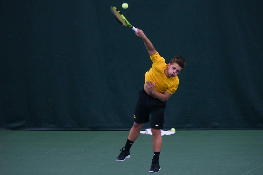 Iowa's Jonas Larsen at a tennis match vs Drake Friday, March 8, 2019 at the Hawkeye Tennis and Recreation Complex. (Lily Smith/hawkeyesports.com)