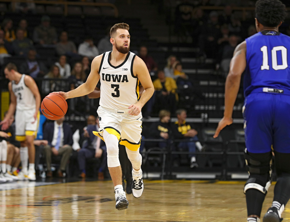 Iowa Hawkeyes guard Jordan Bohannon (3) brings the ball down the court during the first half of their exhibition game against Lindsey Wilson College at Carver-Hawkeye Arena in Iowa City on Monday, Nov 4, 2019. (Stephen Mally/hawkeyesports.com)