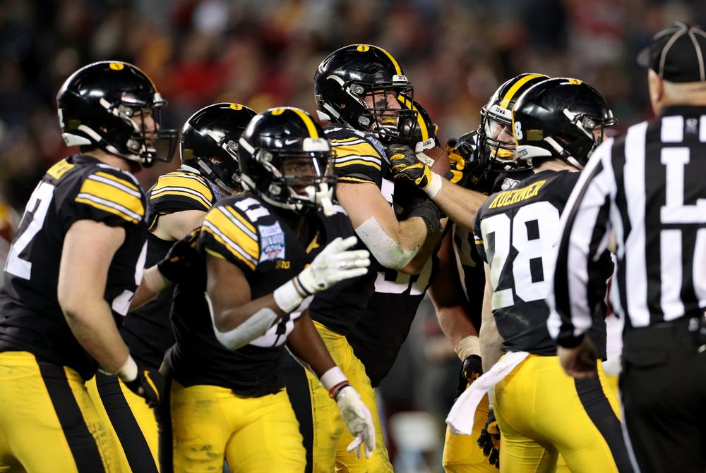 Iowa Hawkeyes linebacker Kristian Welch (34) celebrates after recovering a fumble against USC in the Holiday Bowl Friday, December 27, 2019 at San Diego Community Credit Union Stadium. (Brian Ray/hawkeyesports.com)