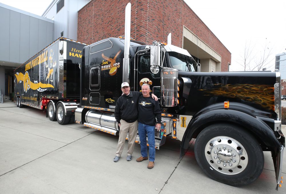 TanTara Transportation Corporation President Mike Riggan and head football equipment manager Greg Morris before departing for Tampa, Florida Friday, December 21, 2018 at the Hansen Football Performance Center. (Brian Ray/hawkeyesports.com)