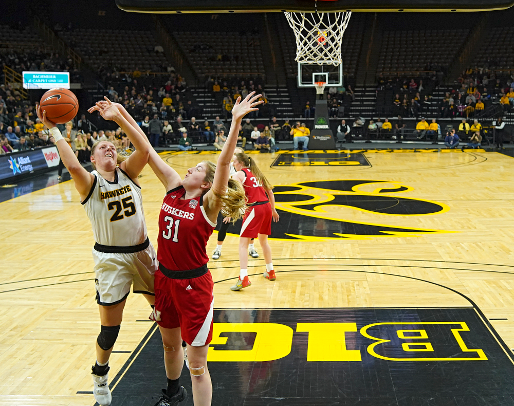 Iowa Hawkeyes forward Monika Czinano (25) puts up a shot during the second quarter of the game at Carver-Hawkeye Arena in Iowa City on Thursday, February 6, 2020. (Stephen Mally/hawkeyesports.com)