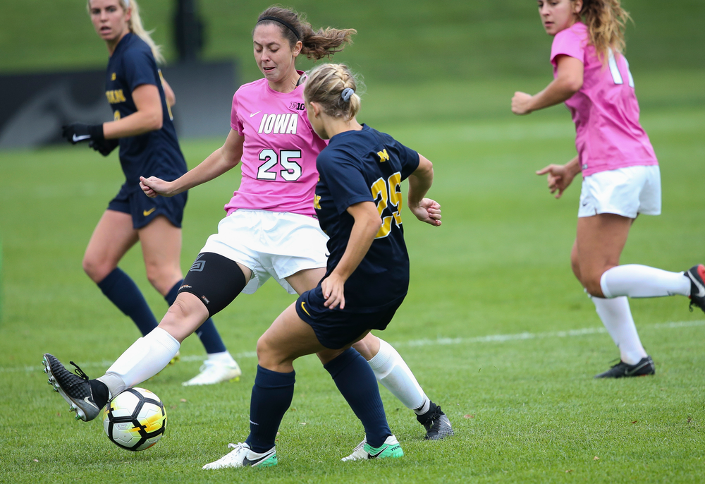 Iowa Hawkeyes midfielder Josie Durr (25) makes a tackle during a game against Michigan at the Iowa Soccer Complex on October 14, 2018. (Tork Mason/hawkeyesports.com)