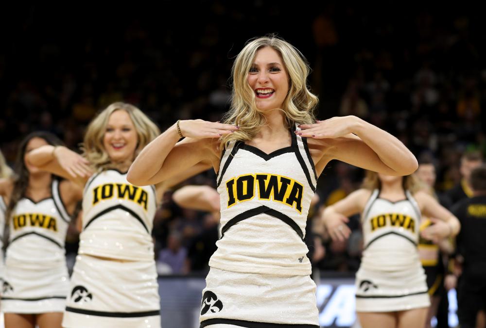 The Iowa Cheerleaders and Dance Team perform on senior night at half-time of the Iowa Hawkeyes game against the Purdue Boilermakers Tuesday, March 3, 2020 at Carver-Hawkeye Arena. (Brian Ray/hawkeyesports.com)