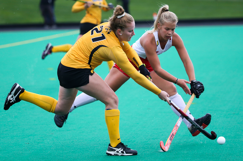 Iowa Hawkeyes midfielder Makenna Maguire (21) dribbles the ball during a game against Maryland at Grant Field on October 14, 2018. (Tork Mason/hawkeyesports.com)